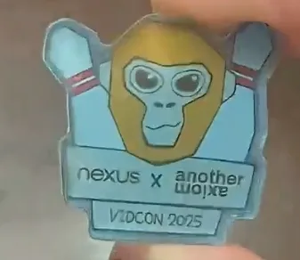 Nexus x Another Axiom VidCon 2025 Pin